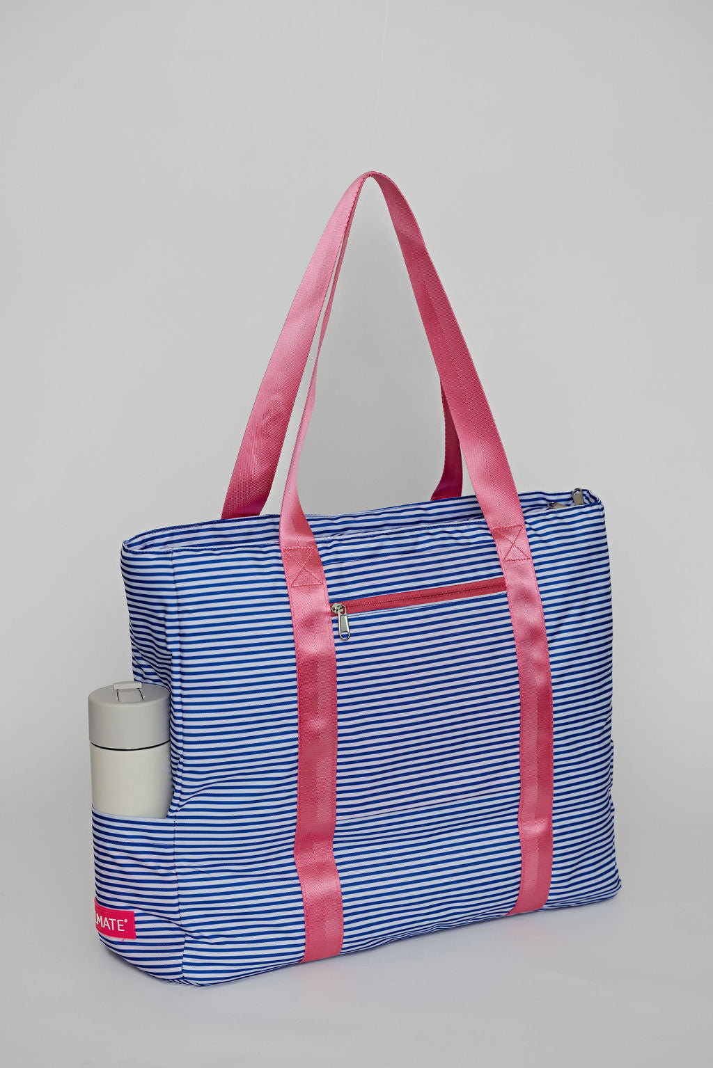blue striped solmate tote bag with exterior pockets for easy travel