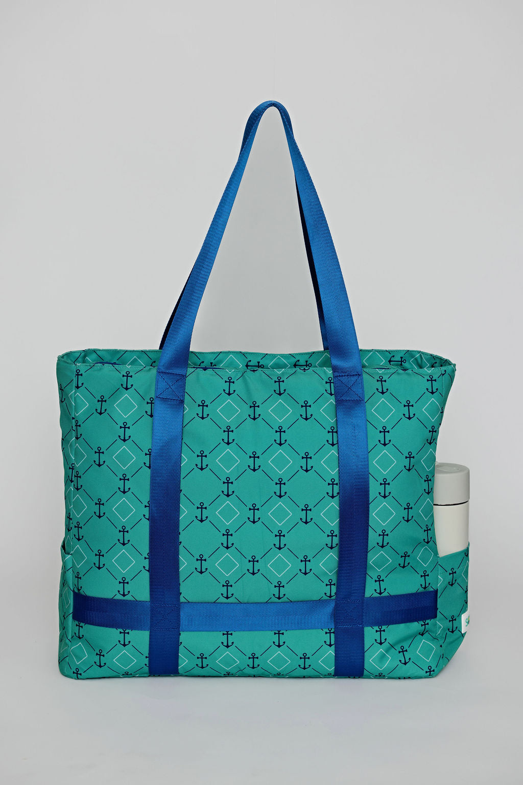 Green solmate tote bag with straps to hold hat when traveling