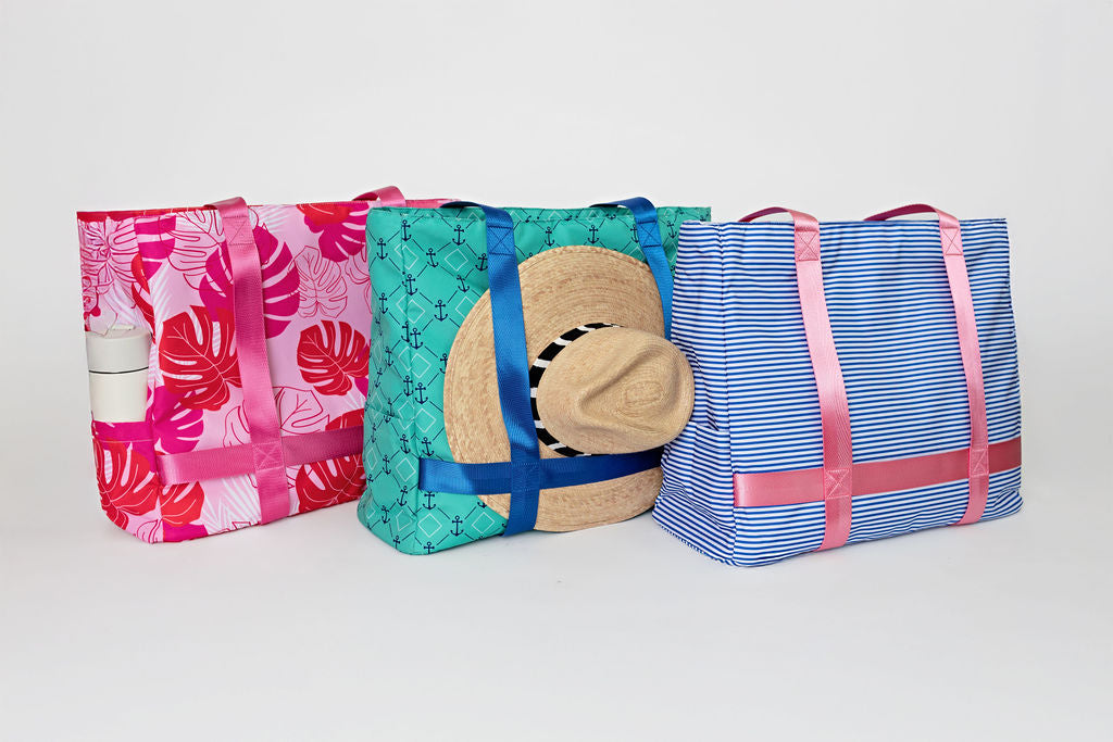 solmate tote bag with straps to hold sunhat with pockets for water bottle
