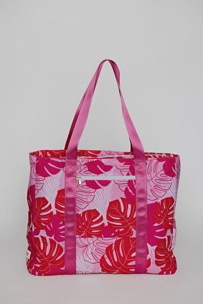 Pink tote bag with trolley sleeve for easy carry on